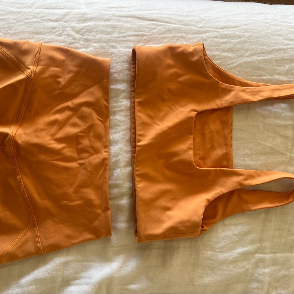 girlfriend collective orange ribbed sports bra and high-waist biker shorts - Picture 3 of 4